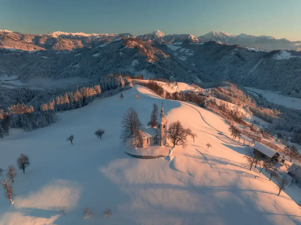Aerial view of St Thomas church in winter