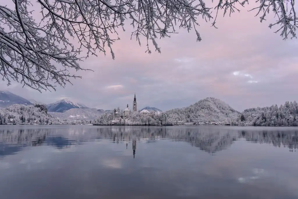 Lake Bled at sunrise after a fresh snowfall