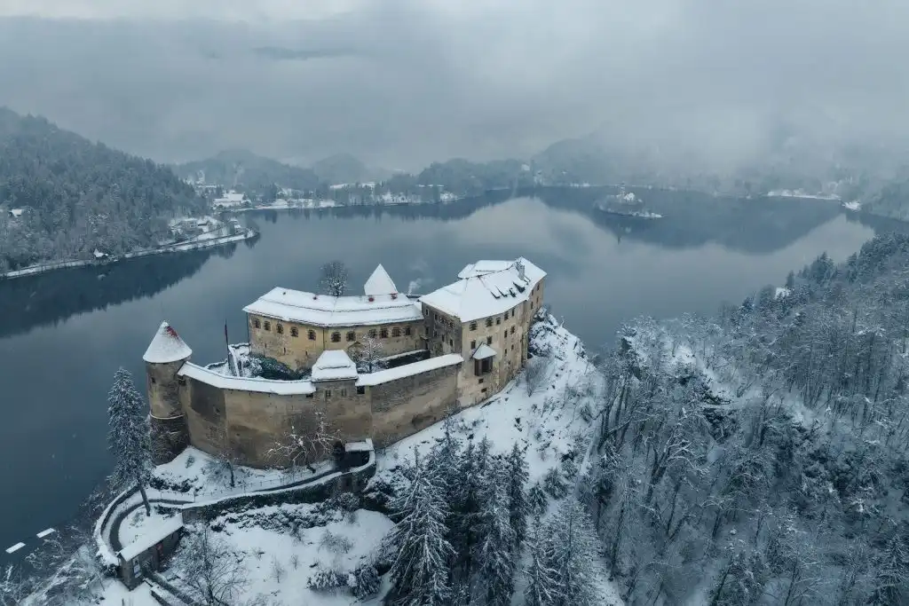 Lake Bled castle covered in snow, Slovenia