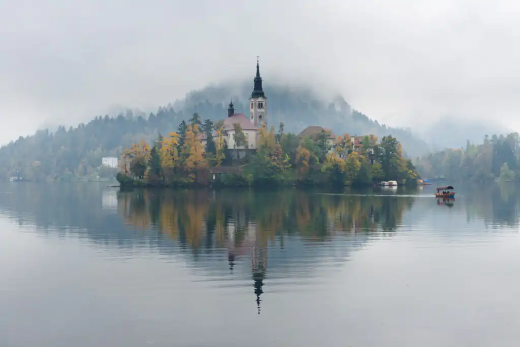 Photographing Lake Bled on a misty Autumn morning.